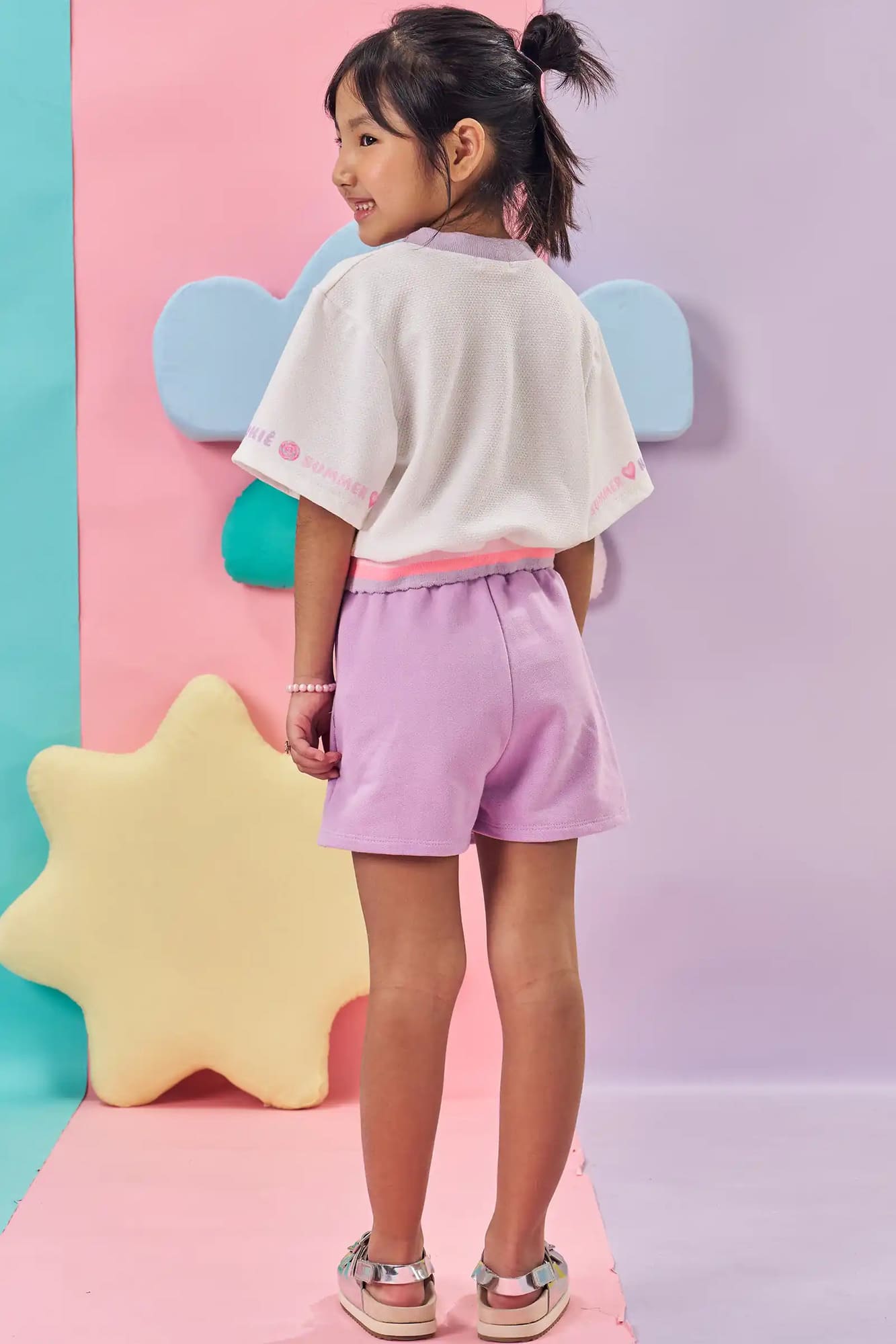 Conjunto Infantil Kukiê Verão com Shorts Saia Lilás e Blusa Branca Cachorrinha Summer