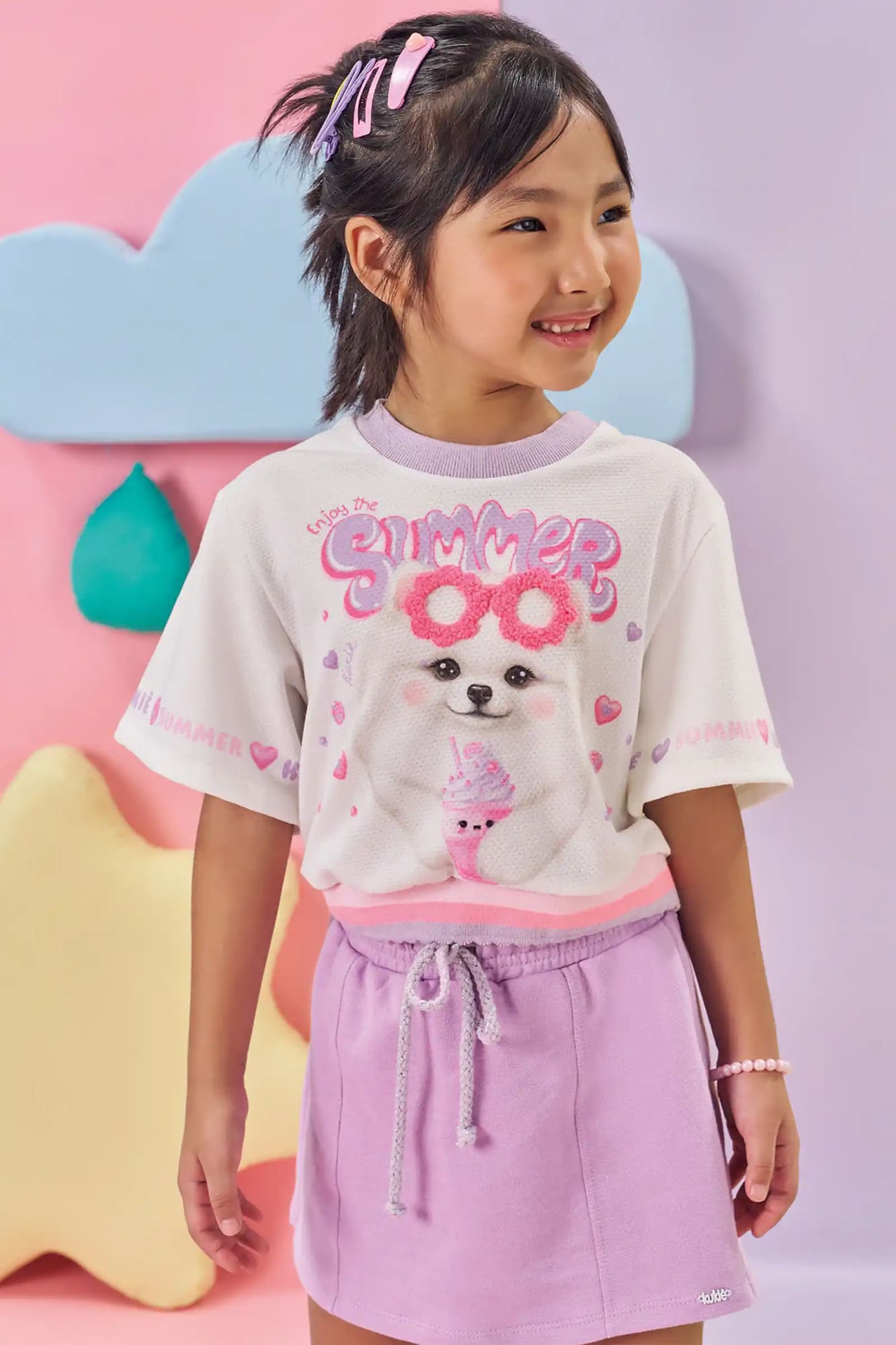 Conjunto Infantil Kukiê Verão com Shorts Saia Lilás e Blusa Branca Cachorrinha Summer