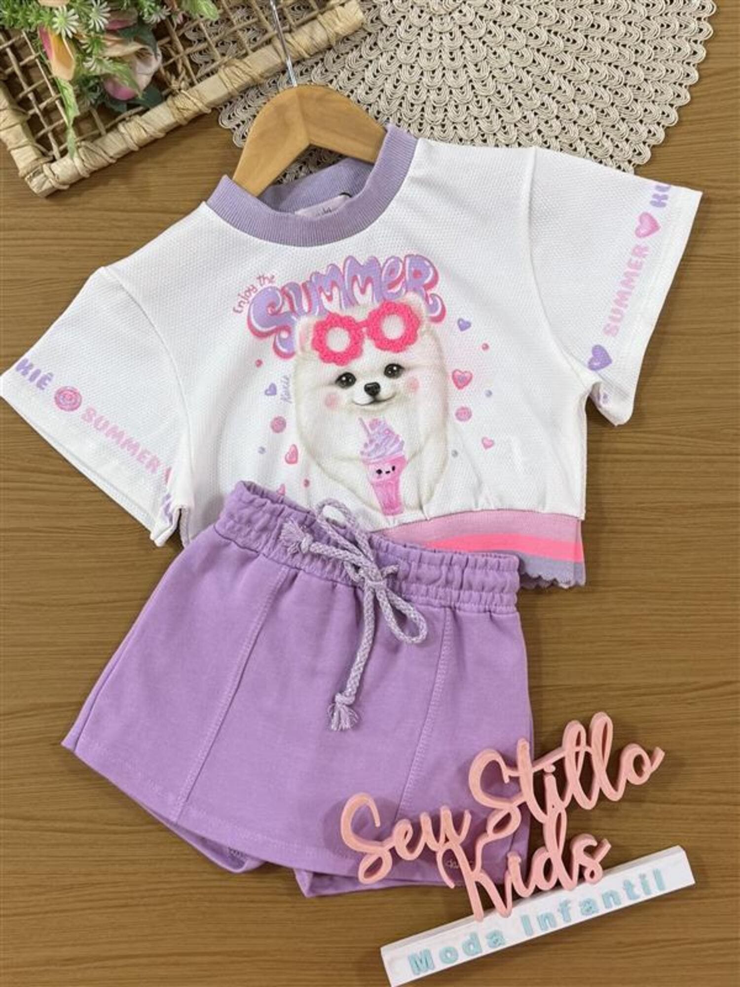 Conjunto Infantil Kukiê Verão com Shorts Saia Lilás e Blusa Branca Cachorrinha Summer