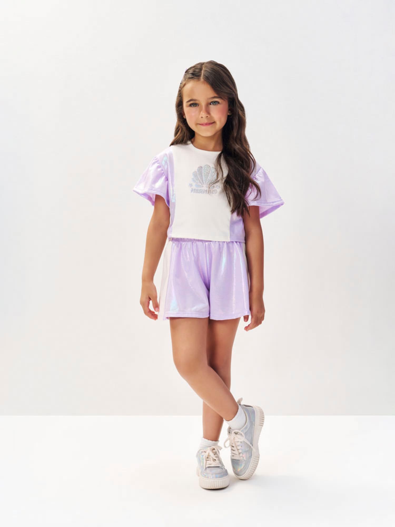 Conjunto Infantil Cinti Verão com Shorts Lilás e Blusa Branca Conchinha