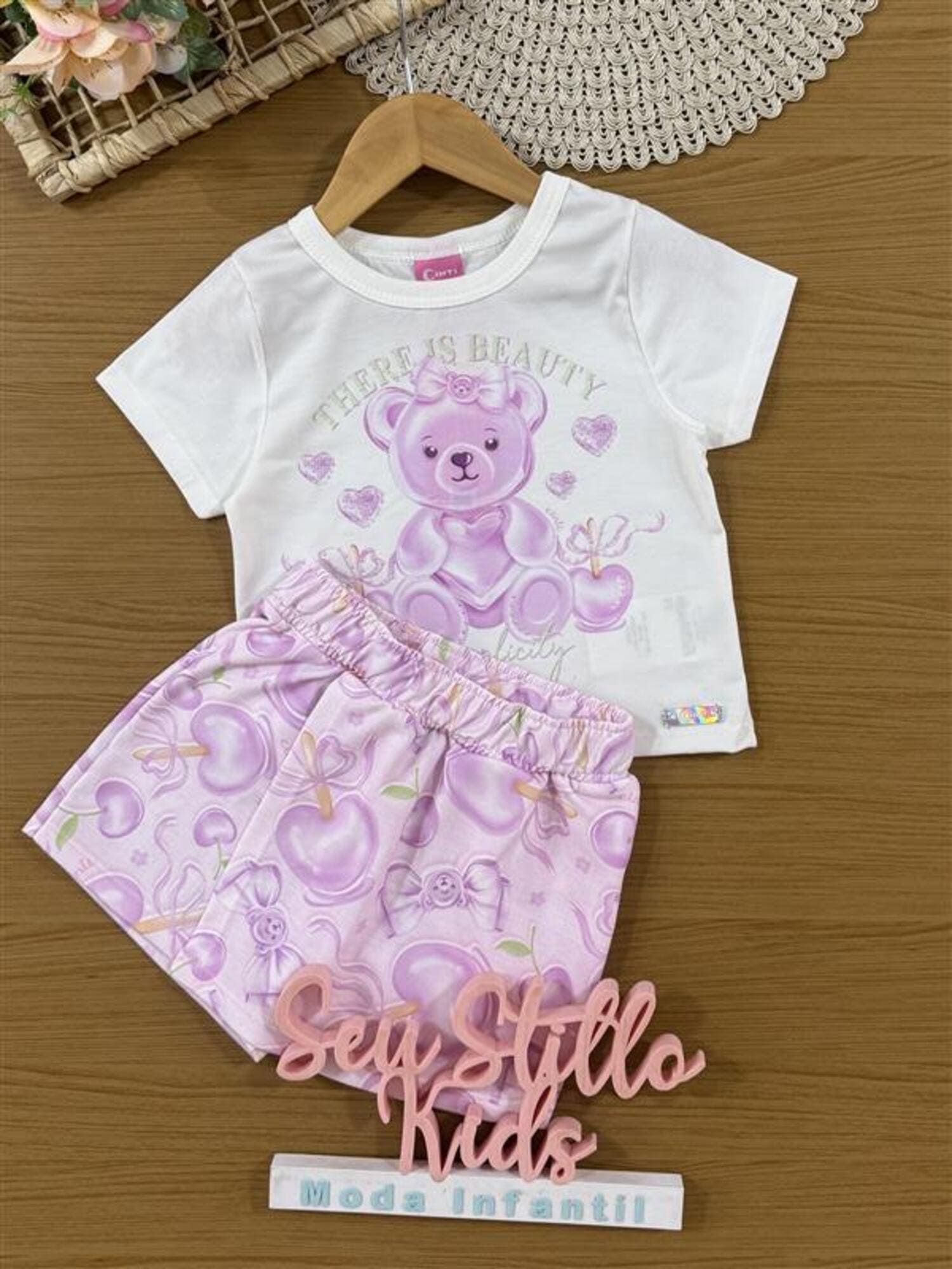 Conjunto Infantil Cinti Verão com Shorts Saia Lilás e Blusa Branca Ursinha Docinho