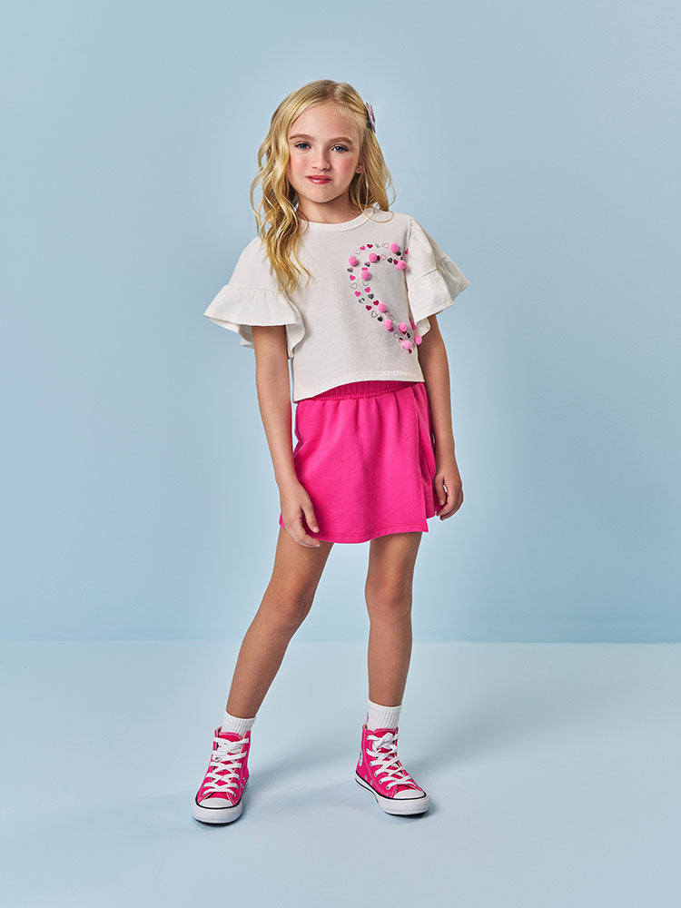 Conjunto Infantil Cinti Verão com Shorts Saia Rosa e Blusa Branca Coração Pompon