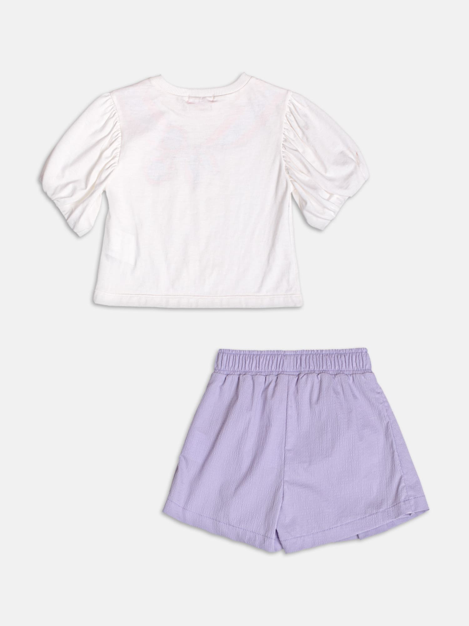Conjunto Infantil Momi Verão com Shorts Saia Lilás e Blusa Branca Laço