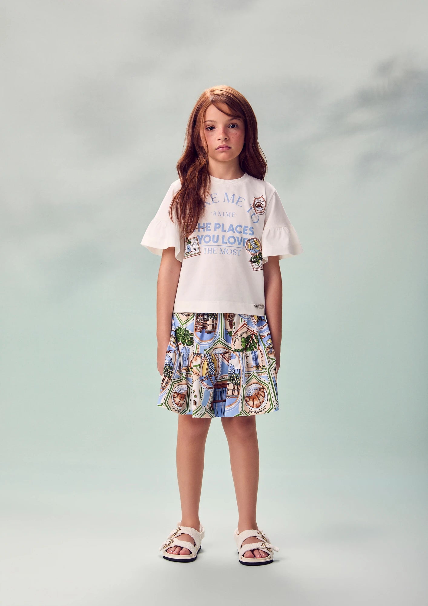Conjunto Infantil Menina Animê com Saia Estampada e Blusa Branca The Places you Love