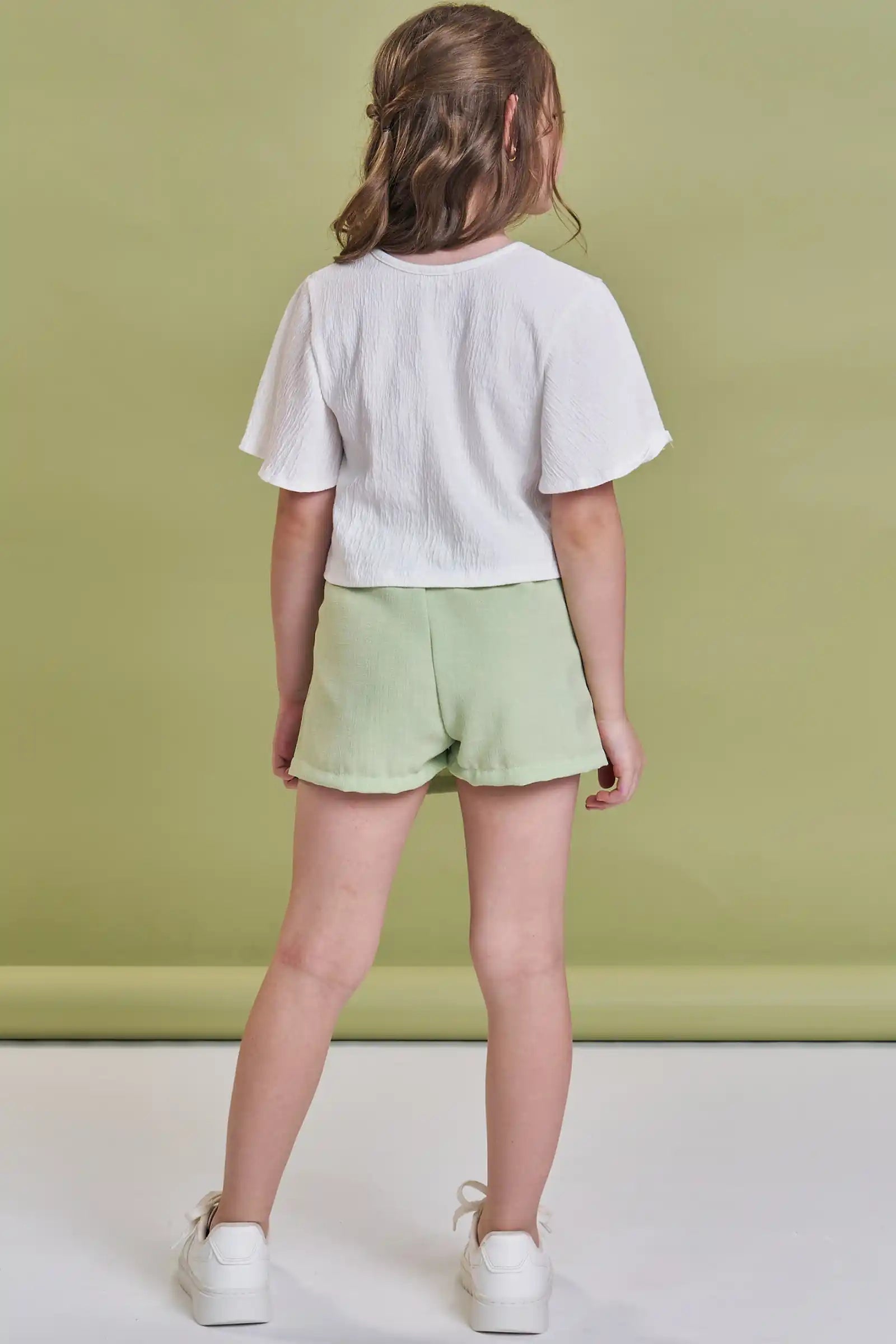 Conjunto Infantil Kukiê Inverno com Shorts Saia Verde e Blusa Maçãzinha