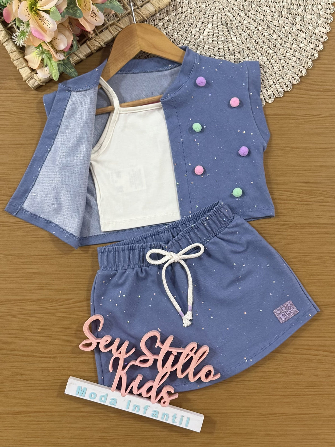 Conjunto Infantil Cinti Verão com Shorts Saia e Cropped com Colete Azul