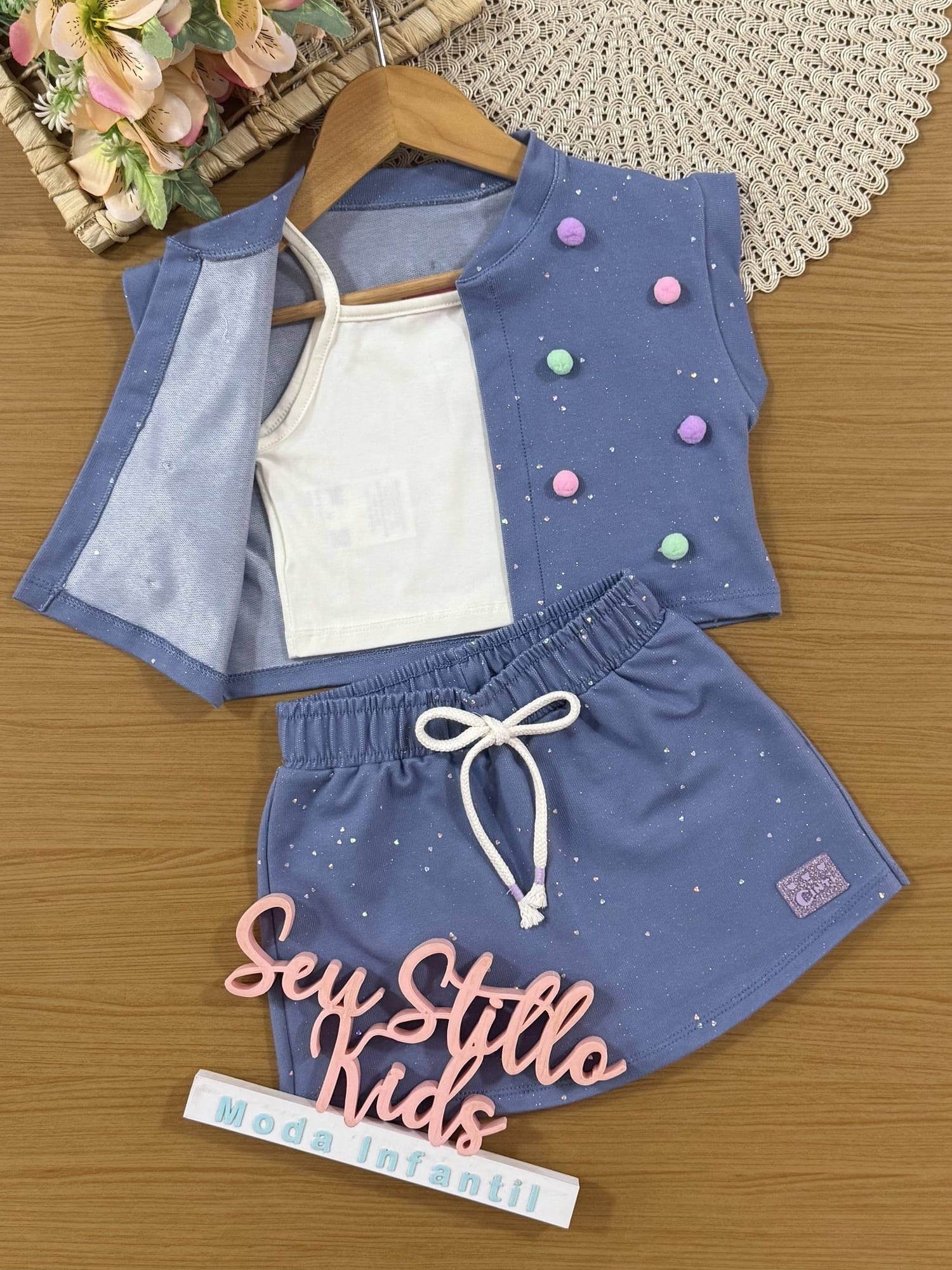 Conjunto Infantil Cinti Verão com Shorts Saia e Cropped com Colete Azul