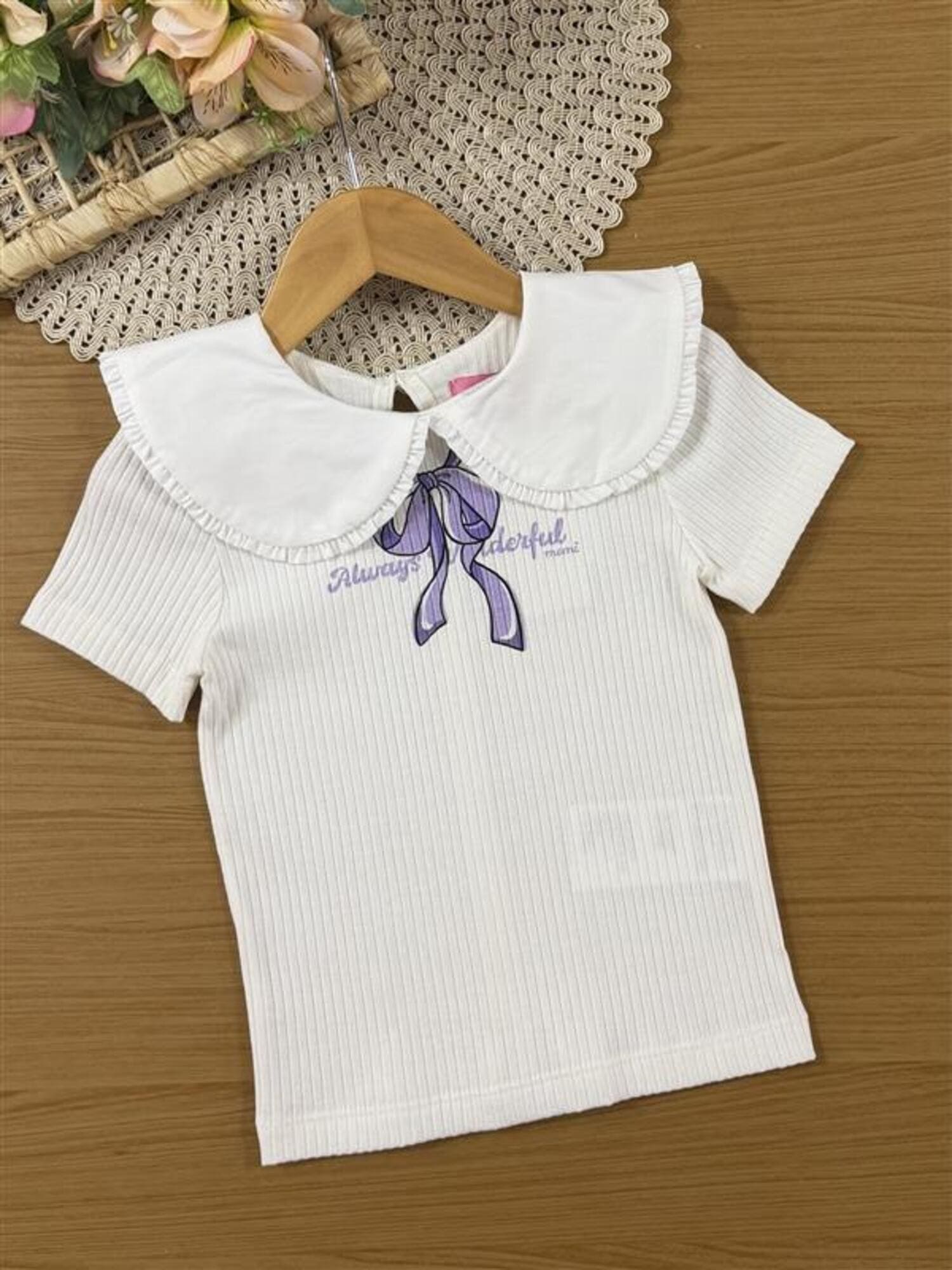 Conjunto Infantil Momi Inverno com Shorts Saia Lilás e Blusa Manga Curta Lacinho