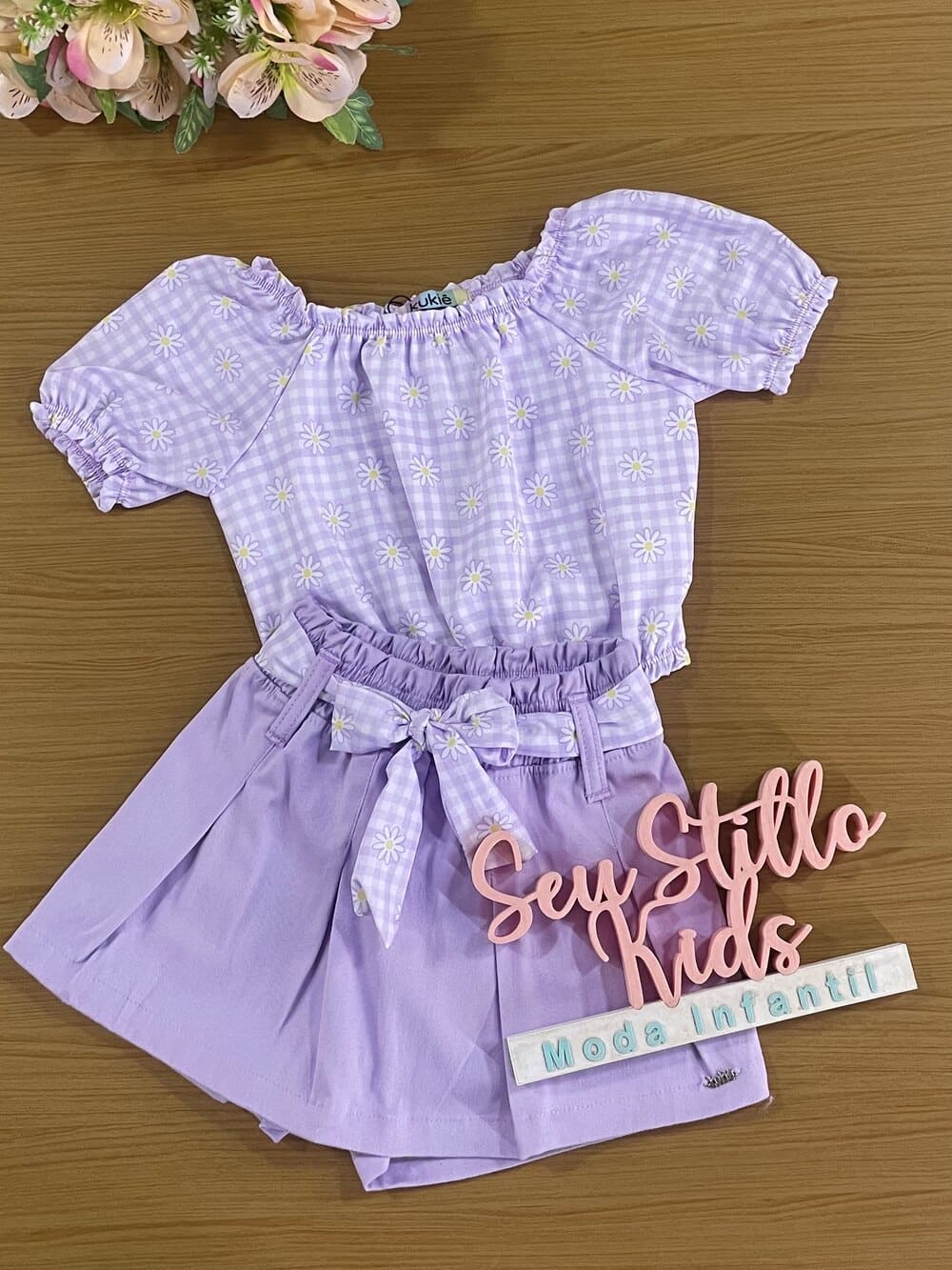 Conjunto Infantil Kukie Verão Com Shorts Saia Lilás e Blusa Florzinha