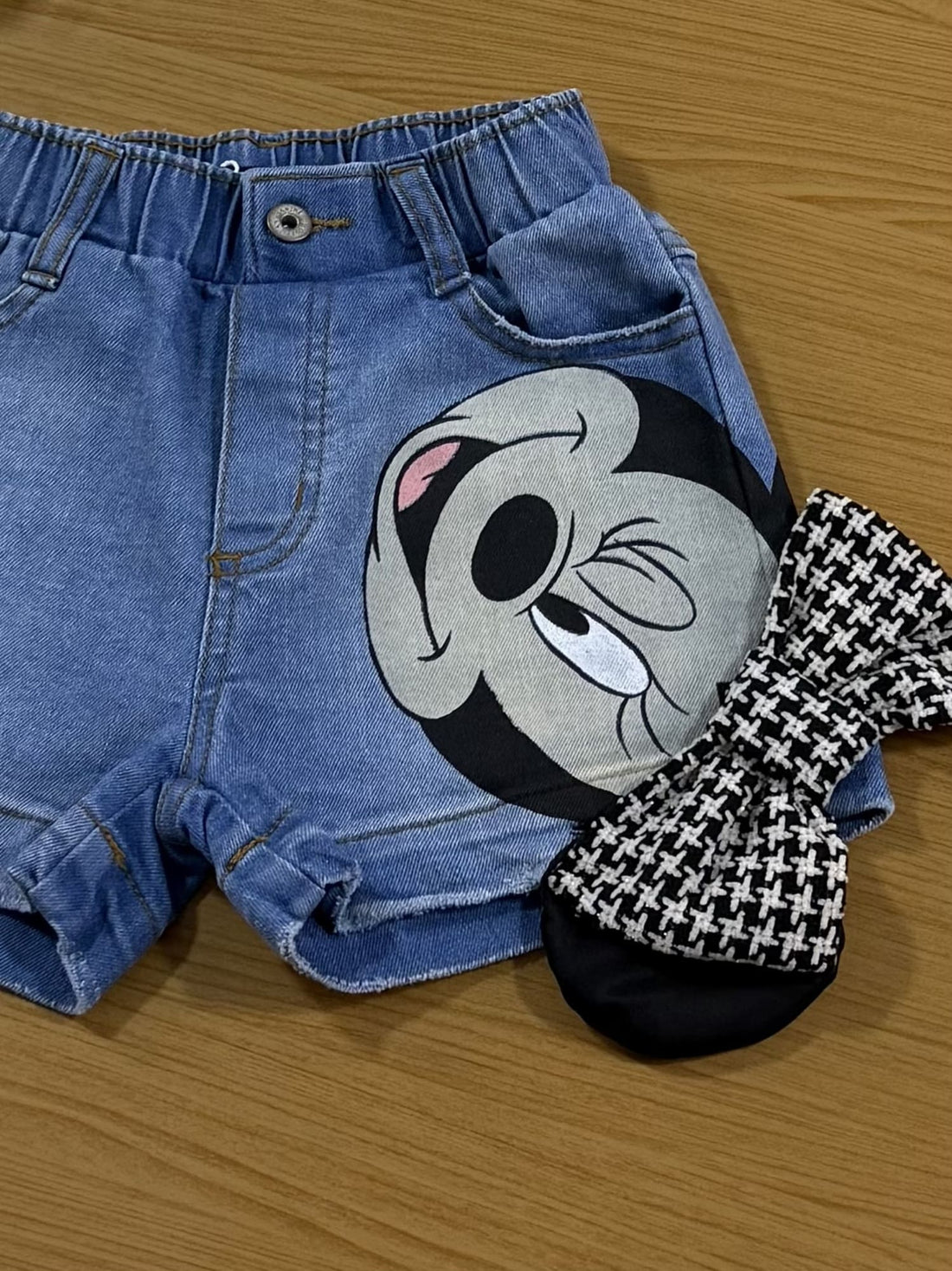 Shorts infantil Animê Jeans Minnie com Laço Disney