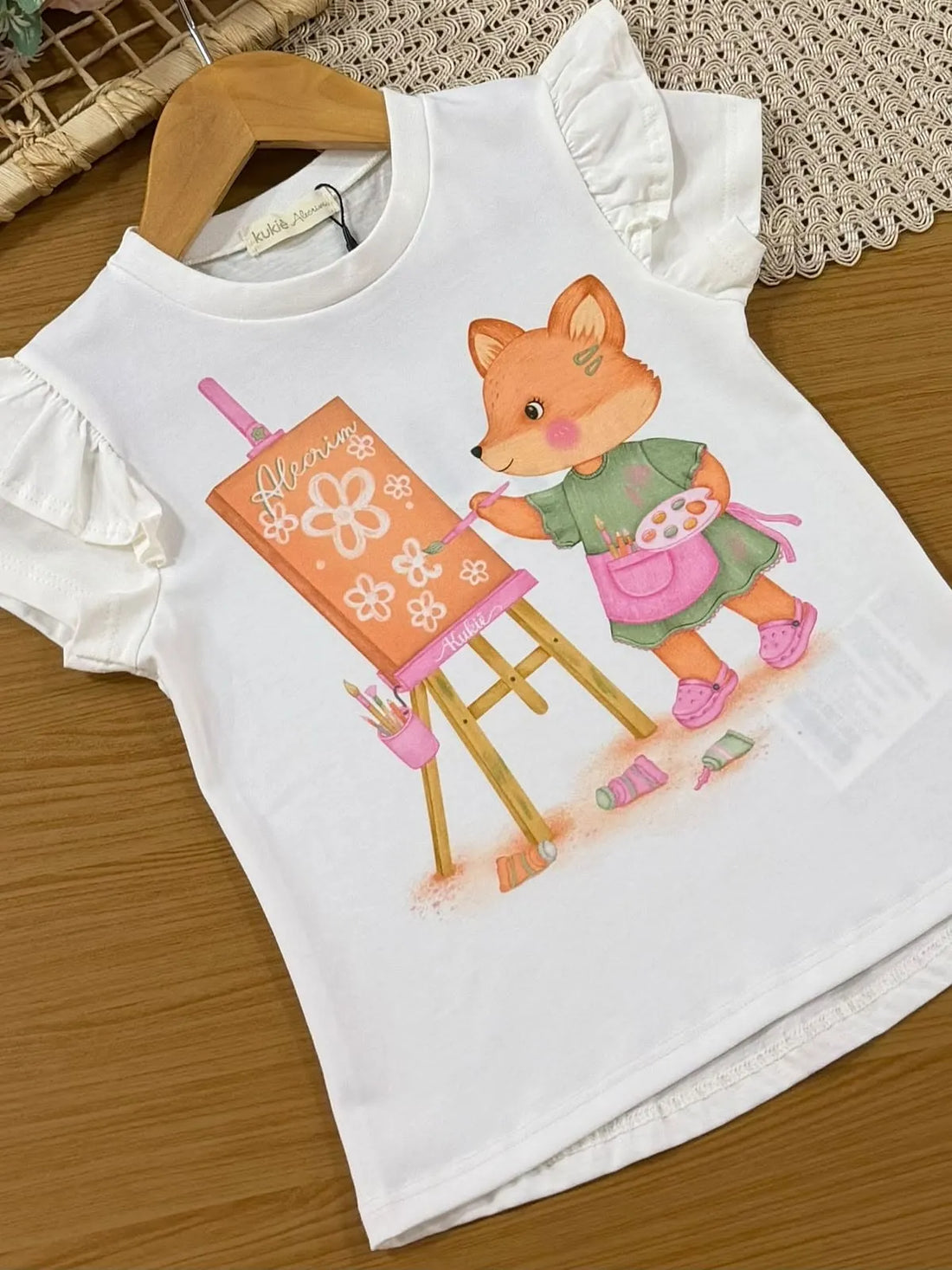 Conjunto Infantil Menina Kukiê com Shorts Ciclista Laranja e Blusa Branca Raposinha Artista