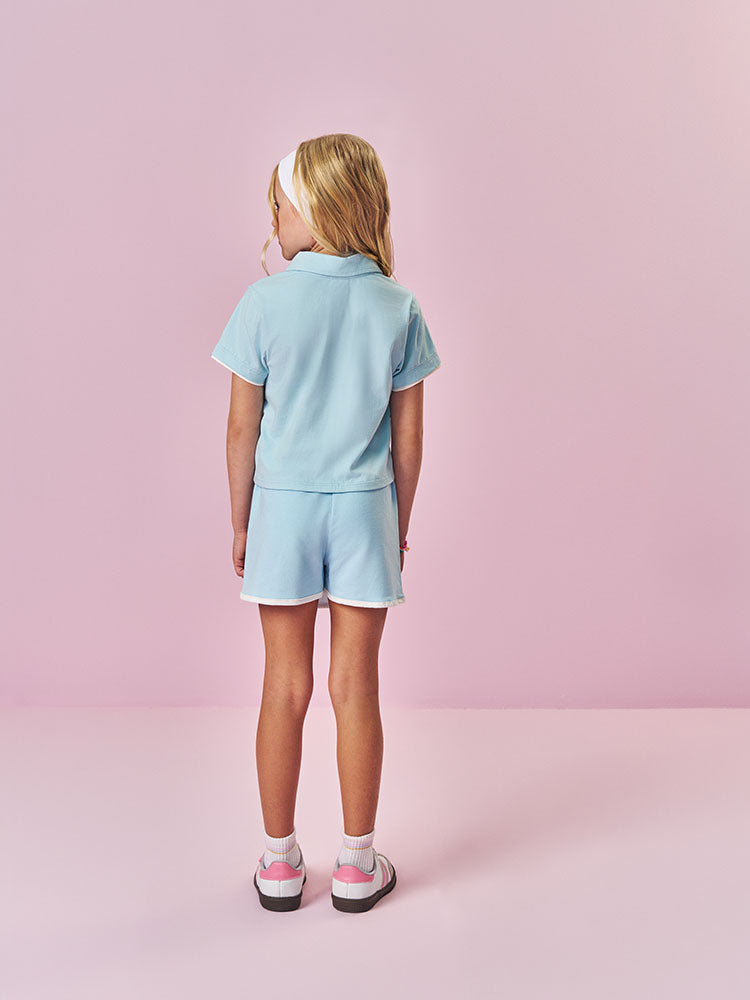 Conjunto Infantil Cinti Verão com Shorts Saia e Blusa Azul Tênista
