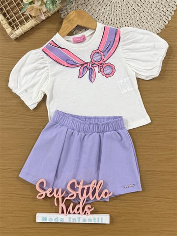 Conjunto Infantil Momi Verão com Shorts Saia Lilás e Blusa Branca Laço