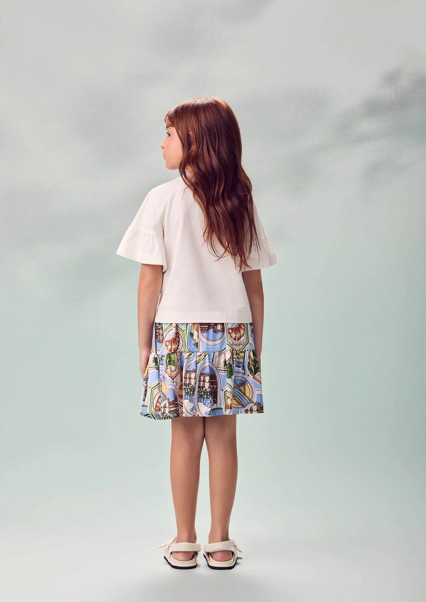 Conjunto Infantil Menina Animê com Saia Estampada e Blusa Branca The Places you Love