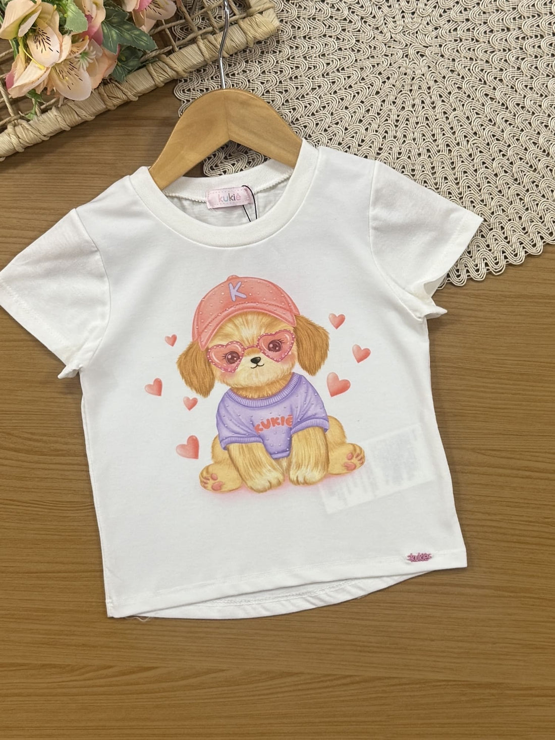 Conjunto Infantil Kukiê Verão com Shorts Laranja e Blusa Branca Cachorrinha com Strass