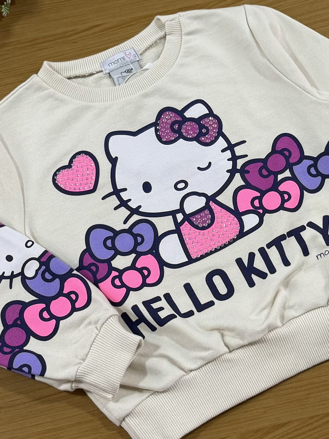 Casaco Infantil Momi Inverno Bege Hello Kitty com Strass