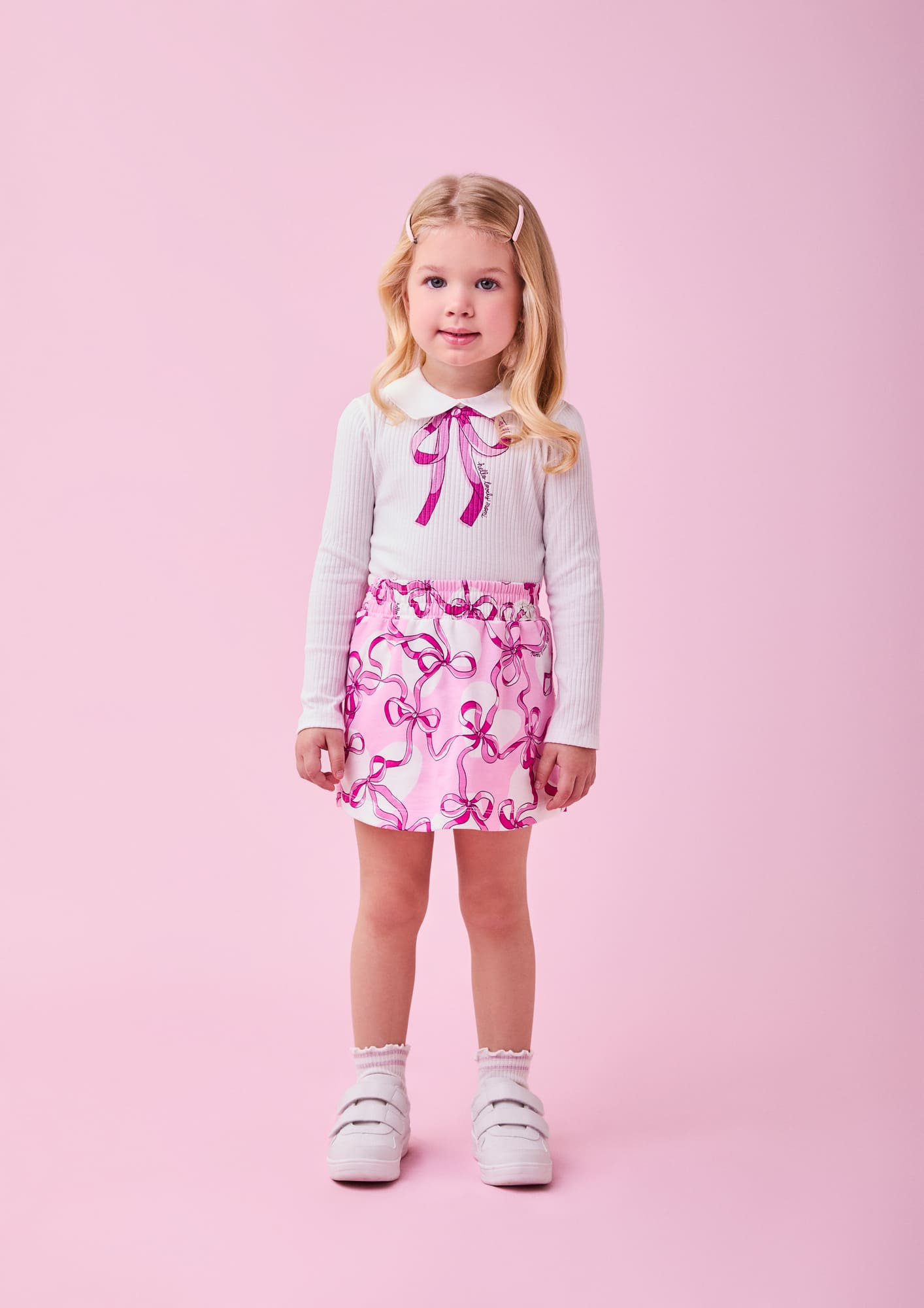 Conjunto Infantil Momi Inverno com Short Saia Rosa e Blusa Branca Lacinho