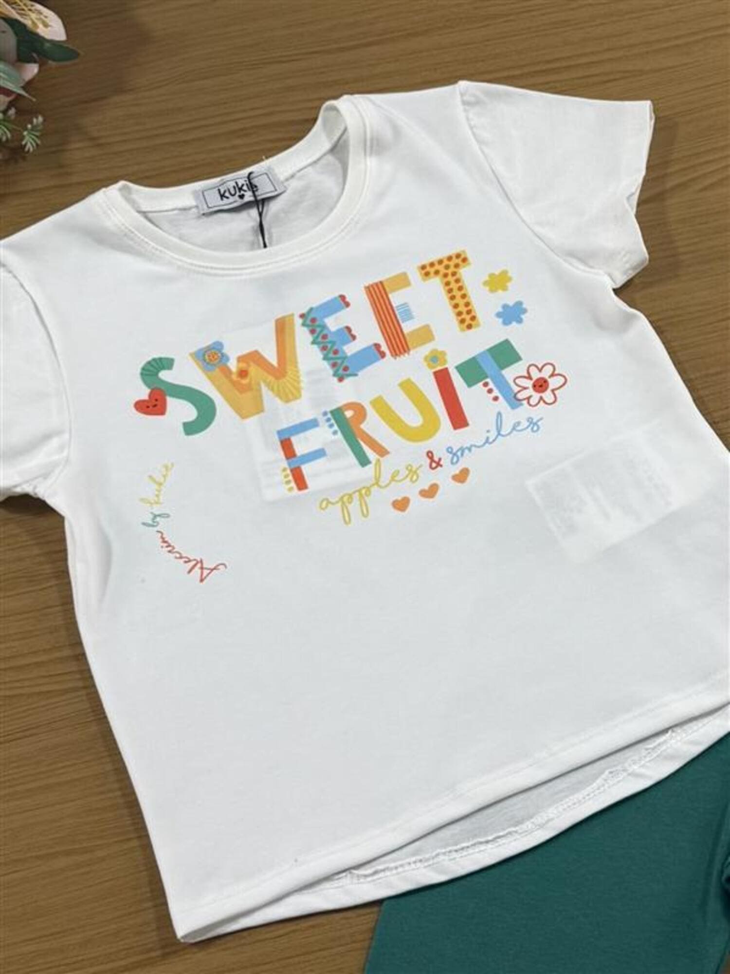 Conjunto Infantil Kukiê com Shorts Ciclista Verde e Blusa Manga Curta Sweet Fruit