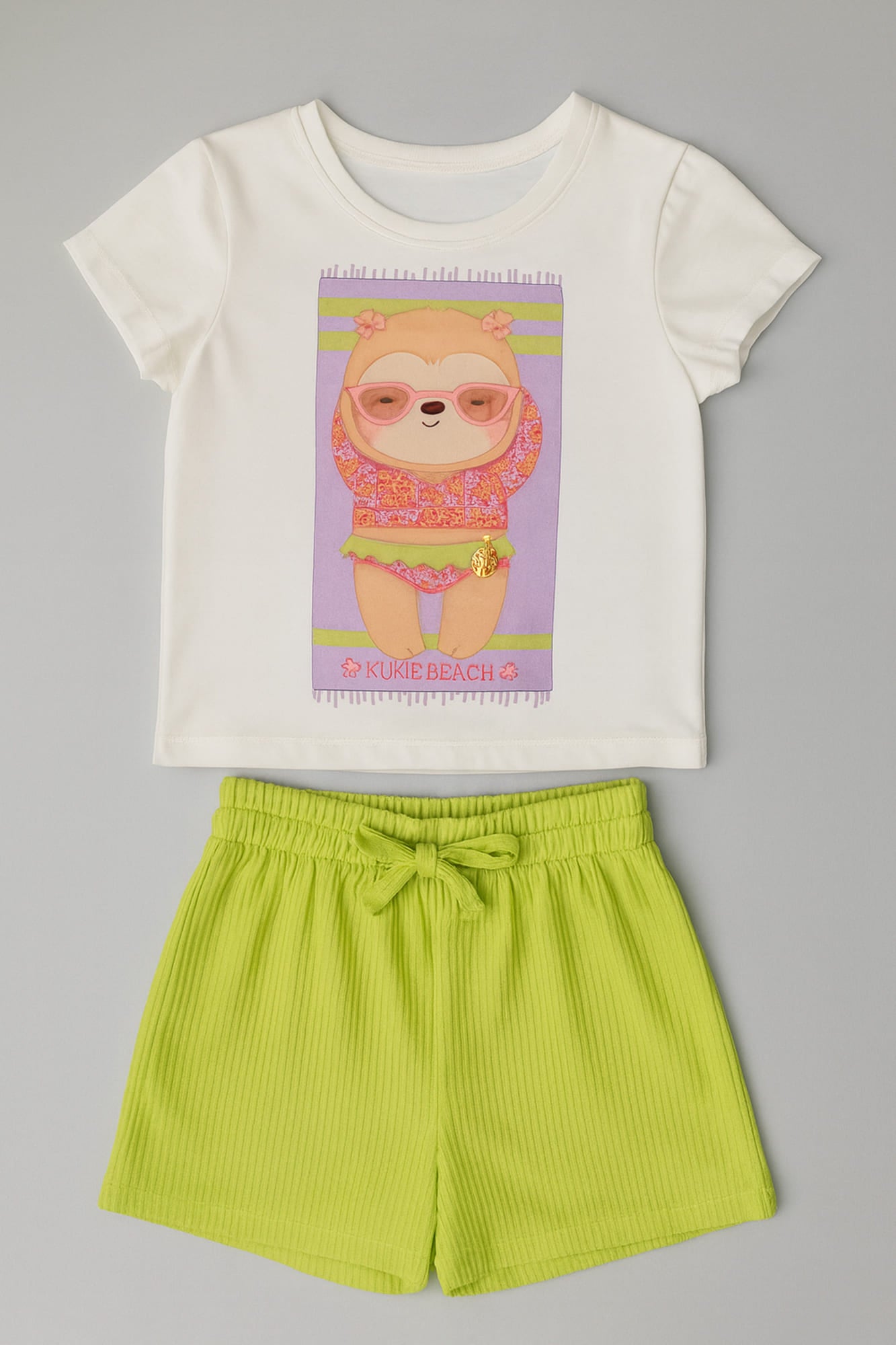 Conjunto Infantil Kukiê Verão com Shorts Saia Verde e Blusa Branca Bichinho Preguiça