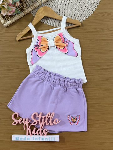 Conjunto Infantil Momi Verão com Shorts Saia Lilás e Regata Branca Lacinho Borboleta