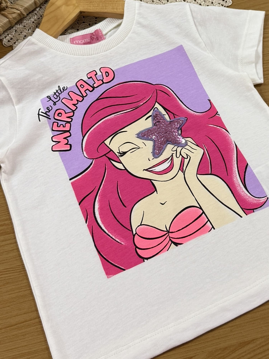 Conjunto Infantil Momi Verão com Shorts Ciclista Lilás e Blusa Branca Ariel Disney