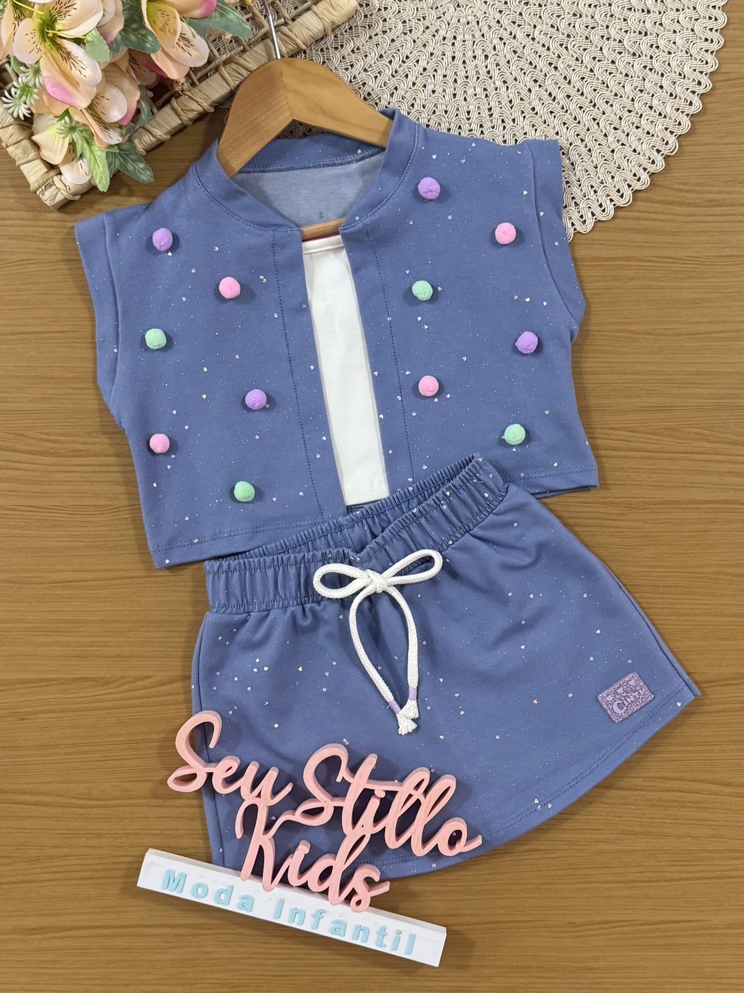 Conjunto Infantil Cinti Verão com Shorts Saia e Cropped com Colete Azul