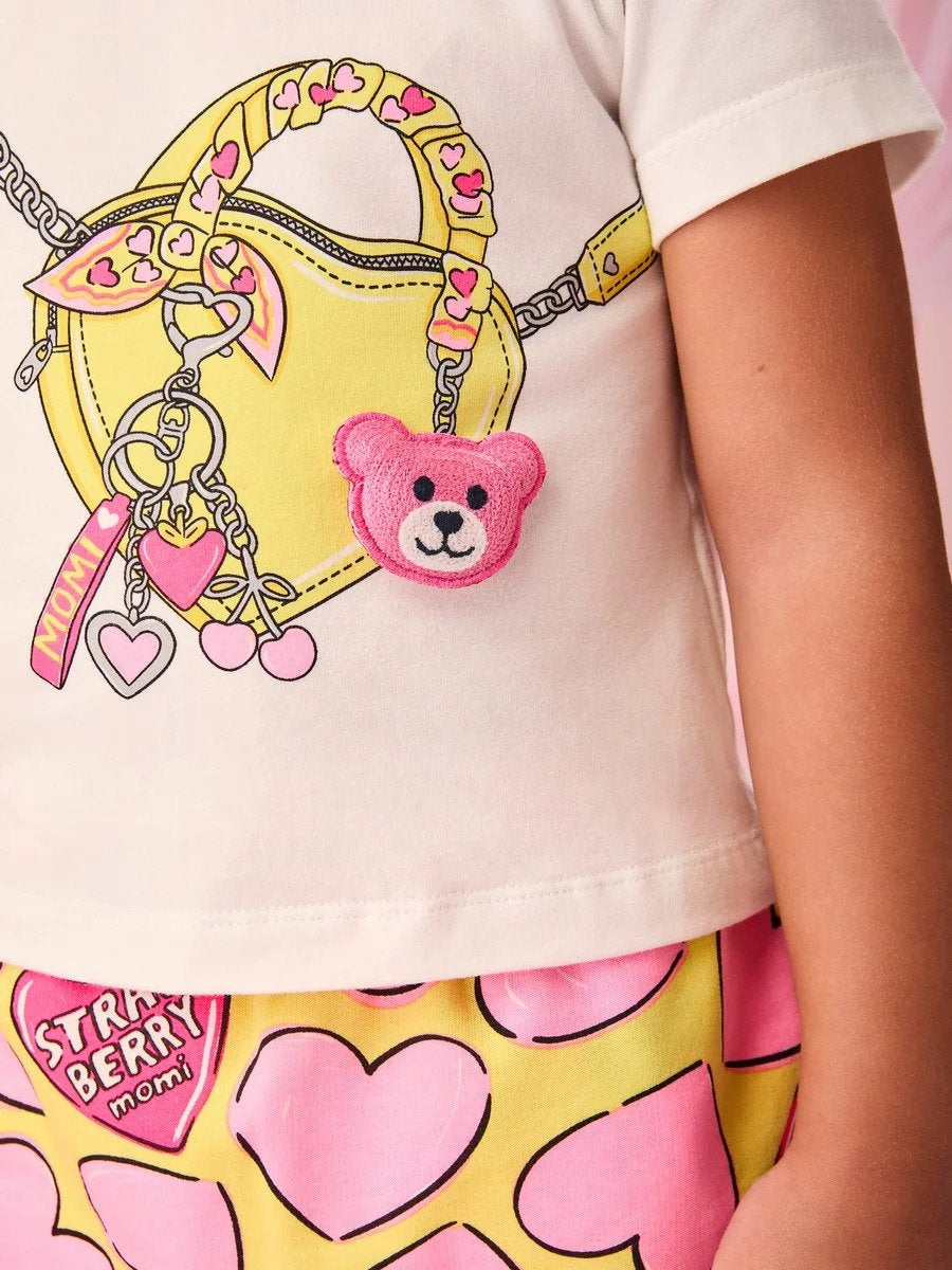 Conjunto Infantil Menina Momi com Shorts Amarelo Coração e Blusa Branca Bolsinha 3D