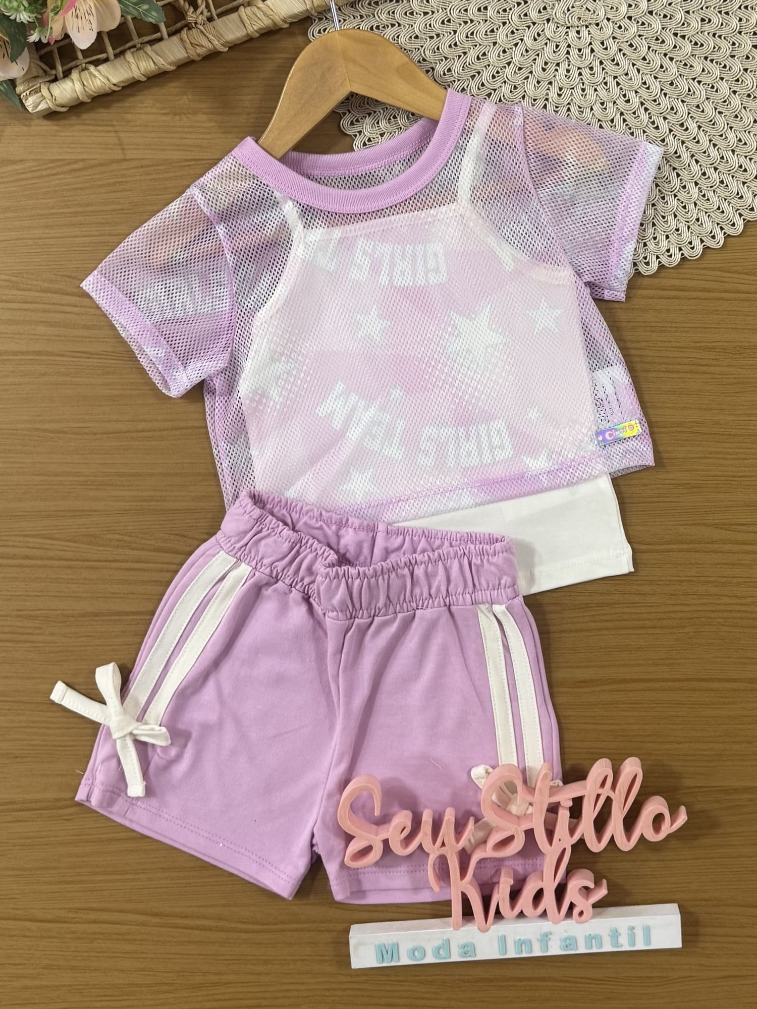 Conjunto Infantil Cinti Verão, Shorts e Sobreposição em Tela Lilás e Regata Branca
