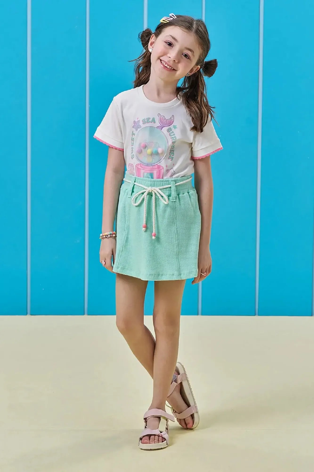 Conjunto Infantil Menina Kukiê com Shorts Saia Azul e Blusa Branca Docinhos
