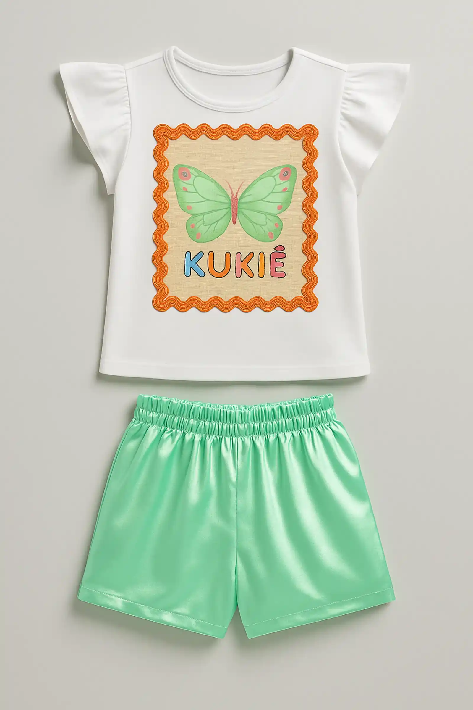 Conjunto Infantil Kukiê com Shorts Verde e Blusa Manga Curta Borboleta