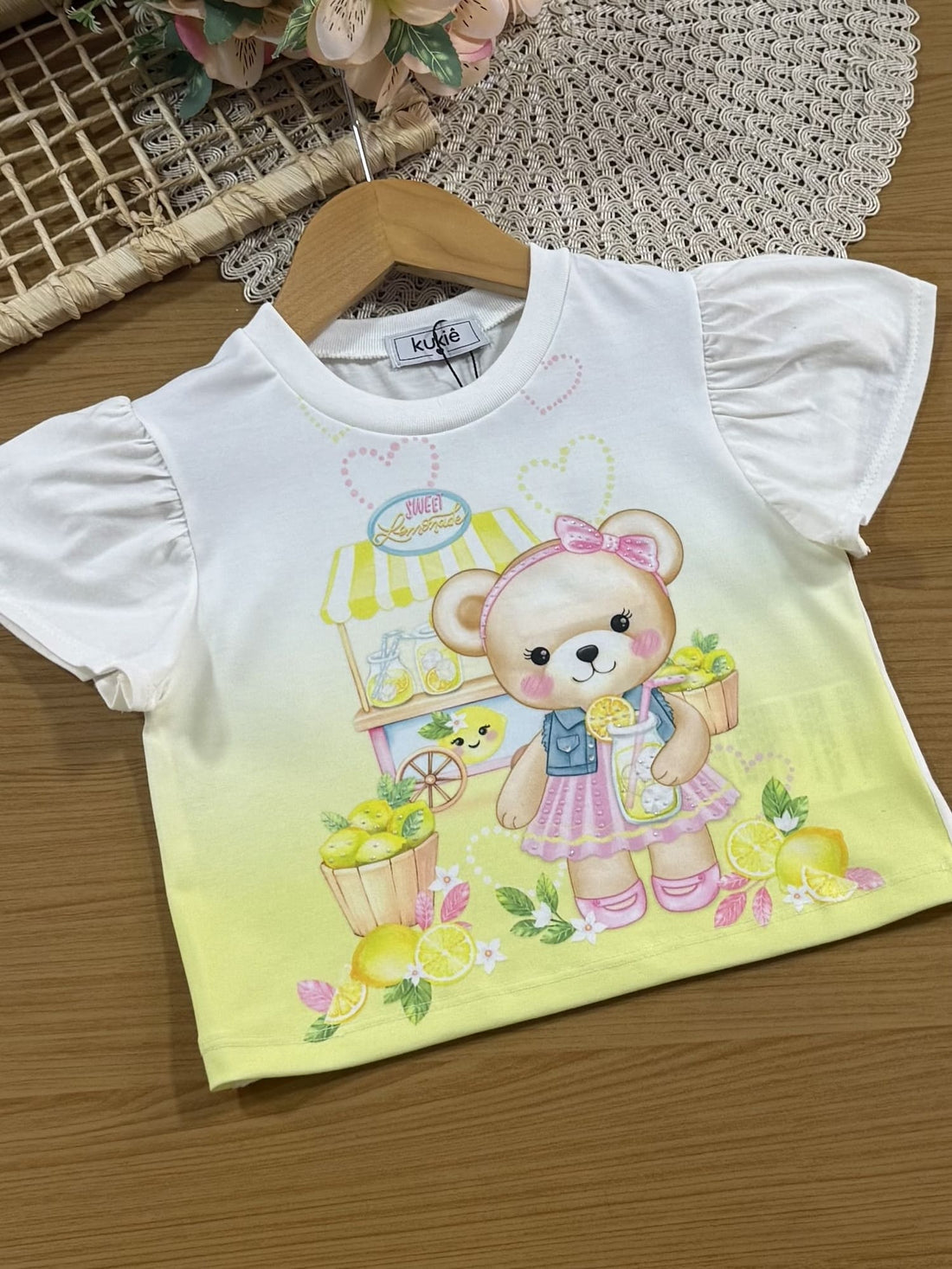 Conjunto Infantil Kukiê com Shorts Saia Jeans e Blusa Manga Curta Ursinha