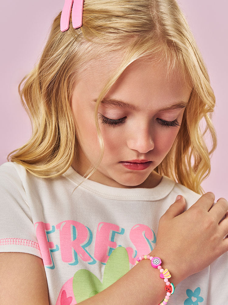 Conjunto Infantil Cinti Verão, Shorts Rosa e Blusa Branca Frutinhas com Pulseira