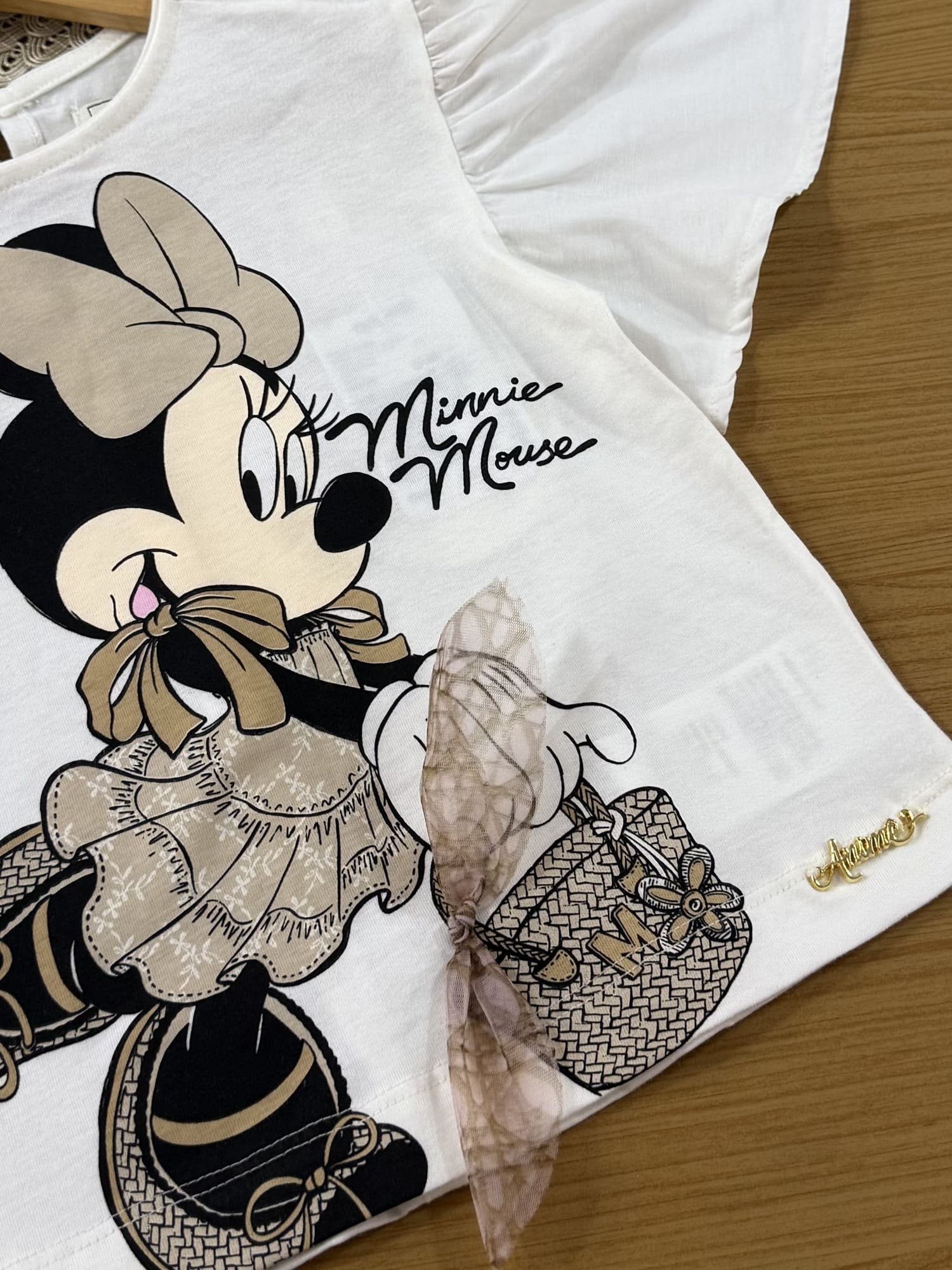 Conjunto Infantil Animê Verão com Saia Dourada em Tule e Blusa Branca Minnie com Laçinho Disney