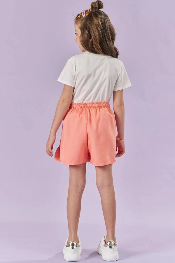 Conjunto Infantil Kukiê Verão com Shorts Laranja e Blusa Branca Cachorrinha com Strass