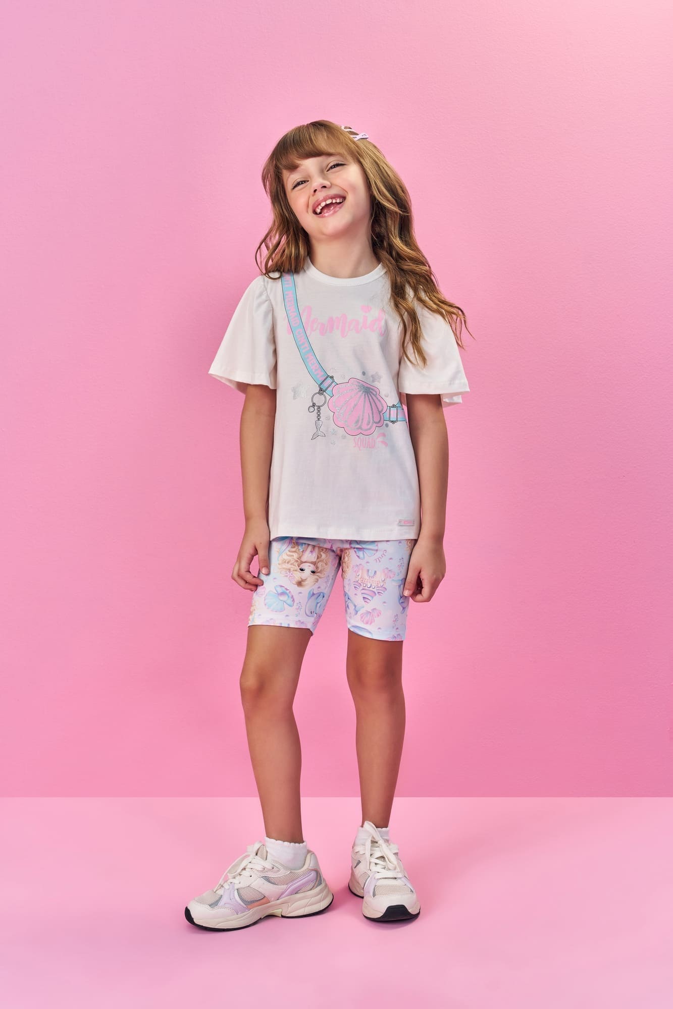 Conjunto Infantil Cinti Verão com Shorts Ciclista Azul e Blusa Branca Conchinha