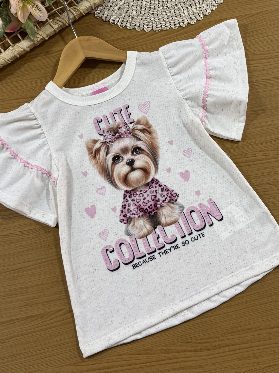 Conjunto Infantil Cinti Verão com Shorts Ciclista Rosa e Blusa Off White Cachorrinha