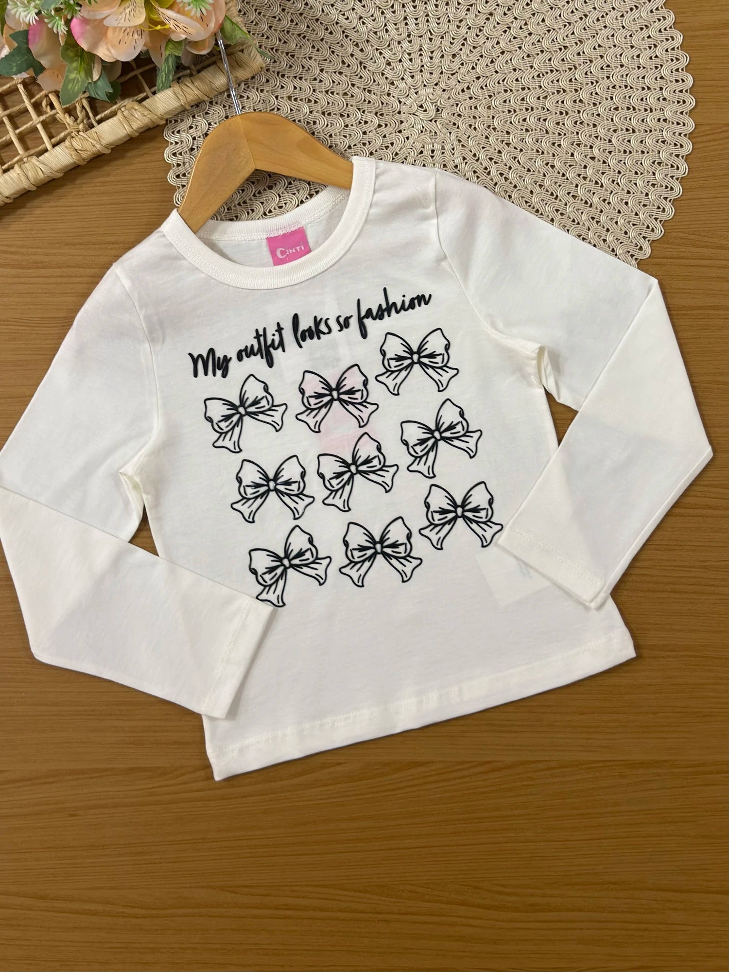 Conjunto Infantil Cinti Invernio com Shorts Saia Preta e Blusa Manga Longa Lacinhos