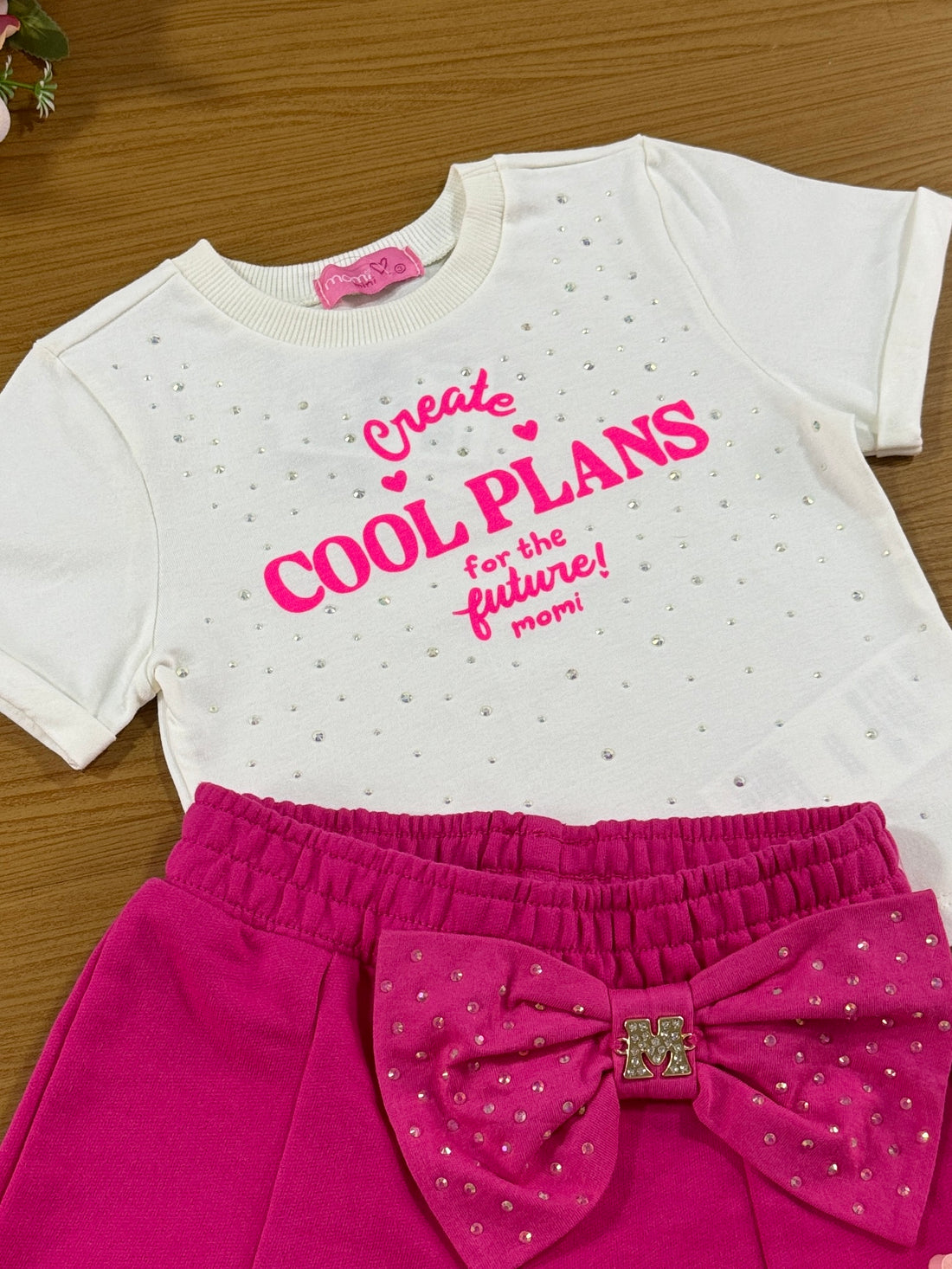 Conjunto Infantil Momi Verão Shorts Rosa Laço e Blusa Brilho