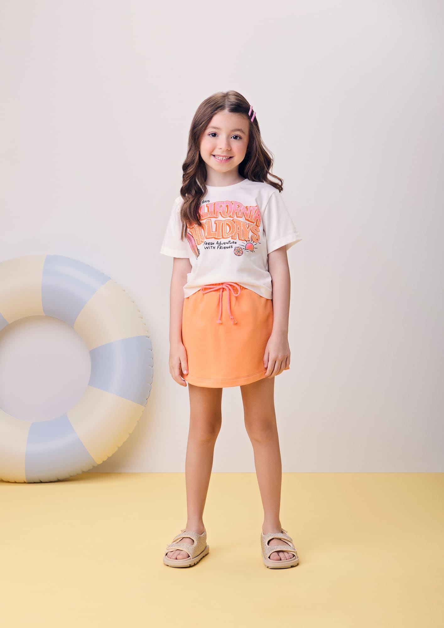 Conjunto Infantil Momi Verão com Shorts Saia Laranja e Blusa Branca California