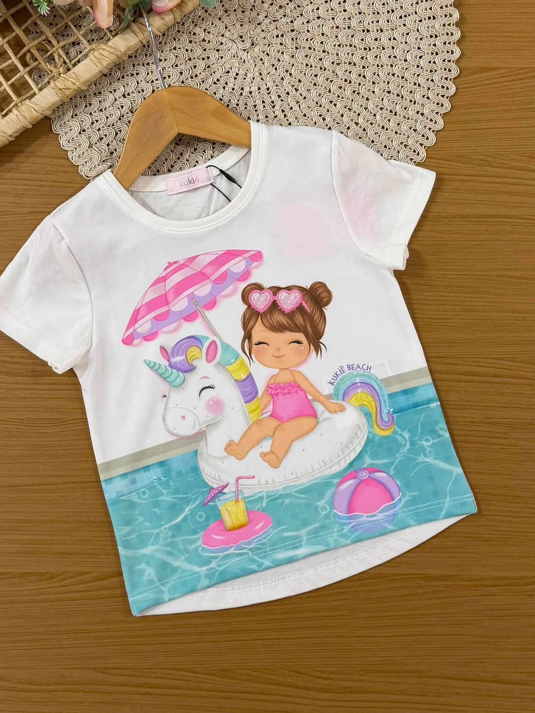 Conjunto Infantil Kukiê com Shorts Roxo e Blusa Hora da Piscina