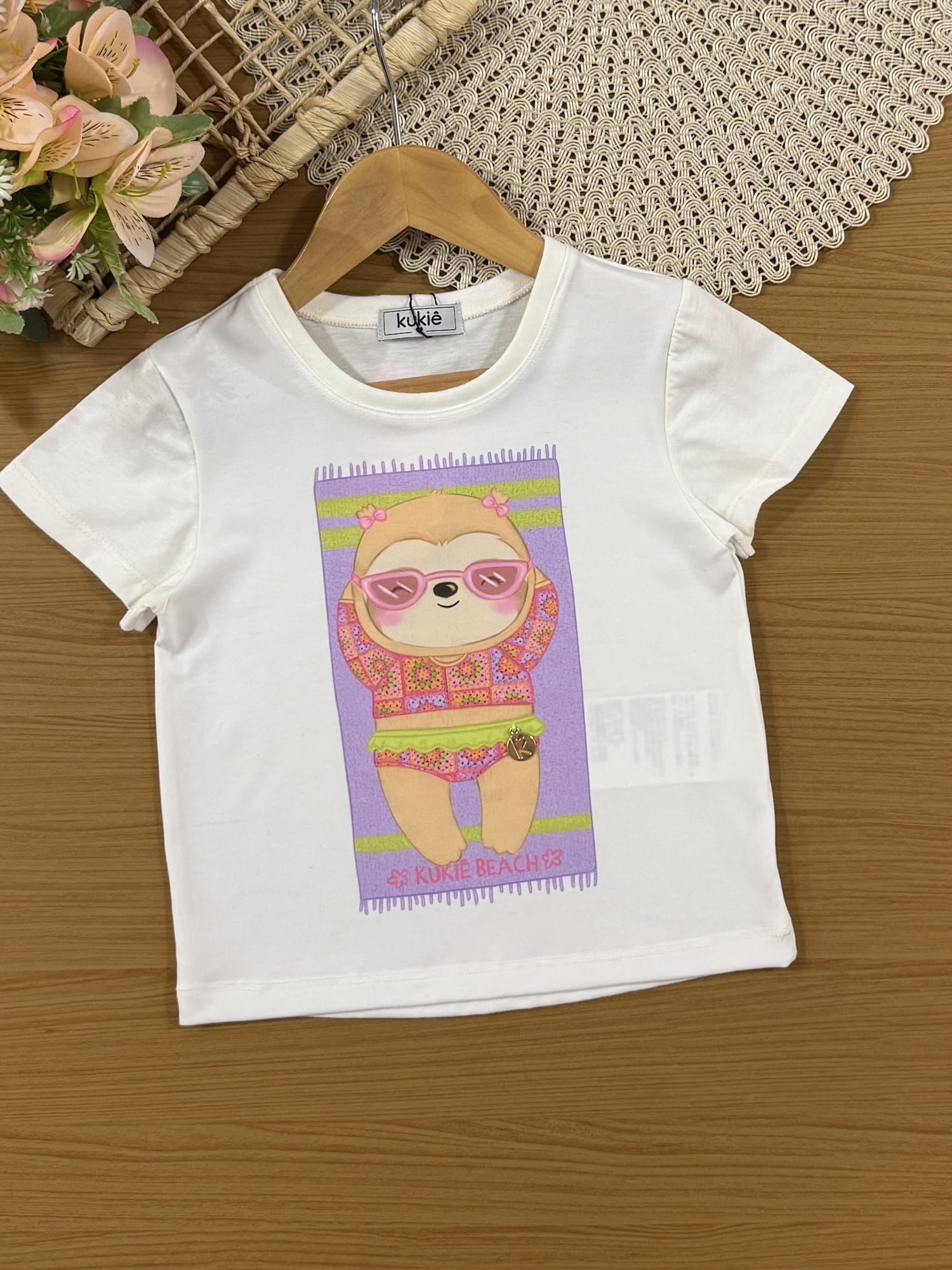 Conjunto Infantil Kukiê Verão com Shorts Saia Verde e Blusa Branca Bichinho Preguiça