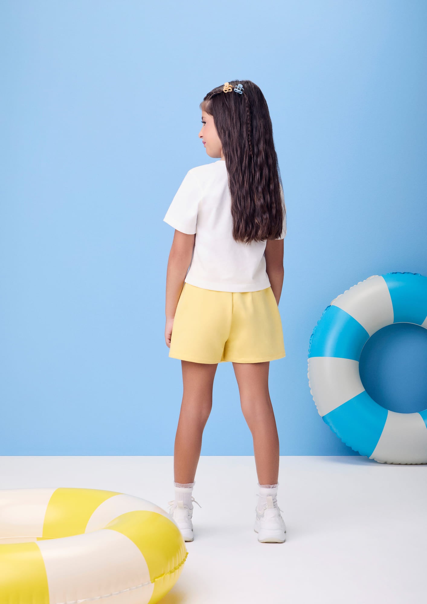 Conjunto Infantil Momi Verão com Shorts Saia Amarelo e Blusa Branca Floral