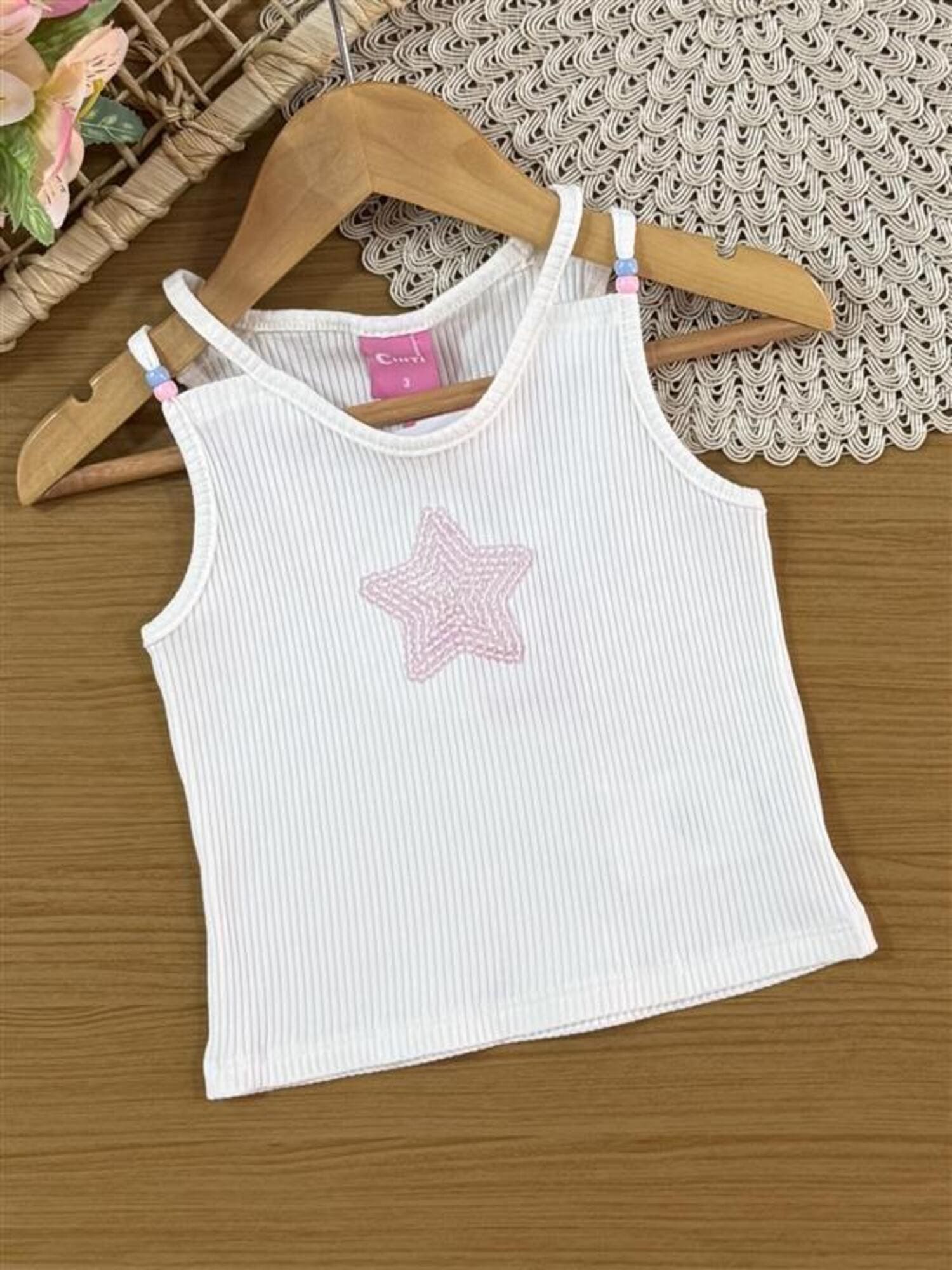 Conjunto Infantil Cinti Verão com Shorts Saia Rosa Estampado e Regata Estrelinha