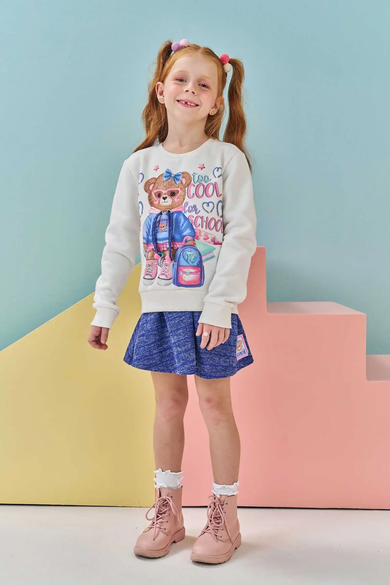 Conjunto Infantil Kukiê Inverno com Saia Azul e Casaco Branco Ursinha com Strass