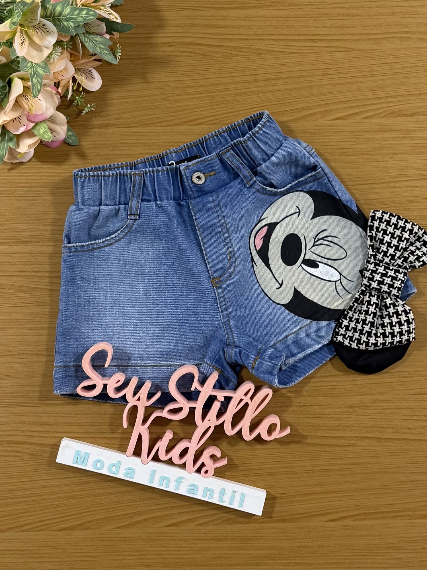 Shorts infantil Animê Jeans Minnie com Laço Disney