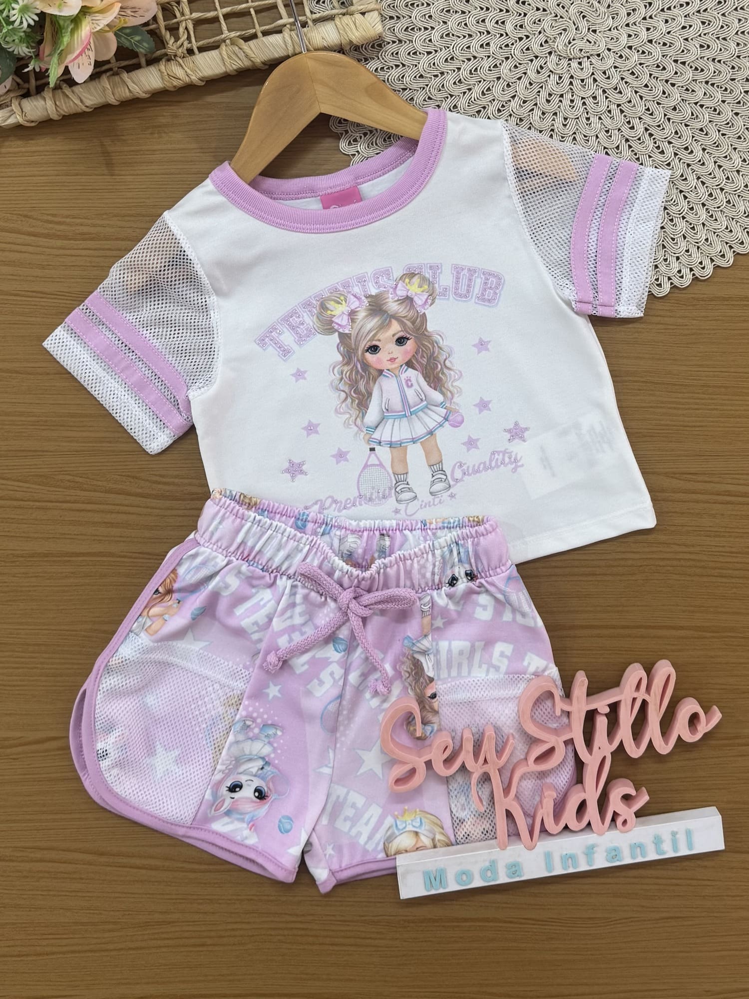 Conjunto Infantil Cinti Verão com Shorts Lilás e Blusa Branca Lider de Torcida Tennis Club
