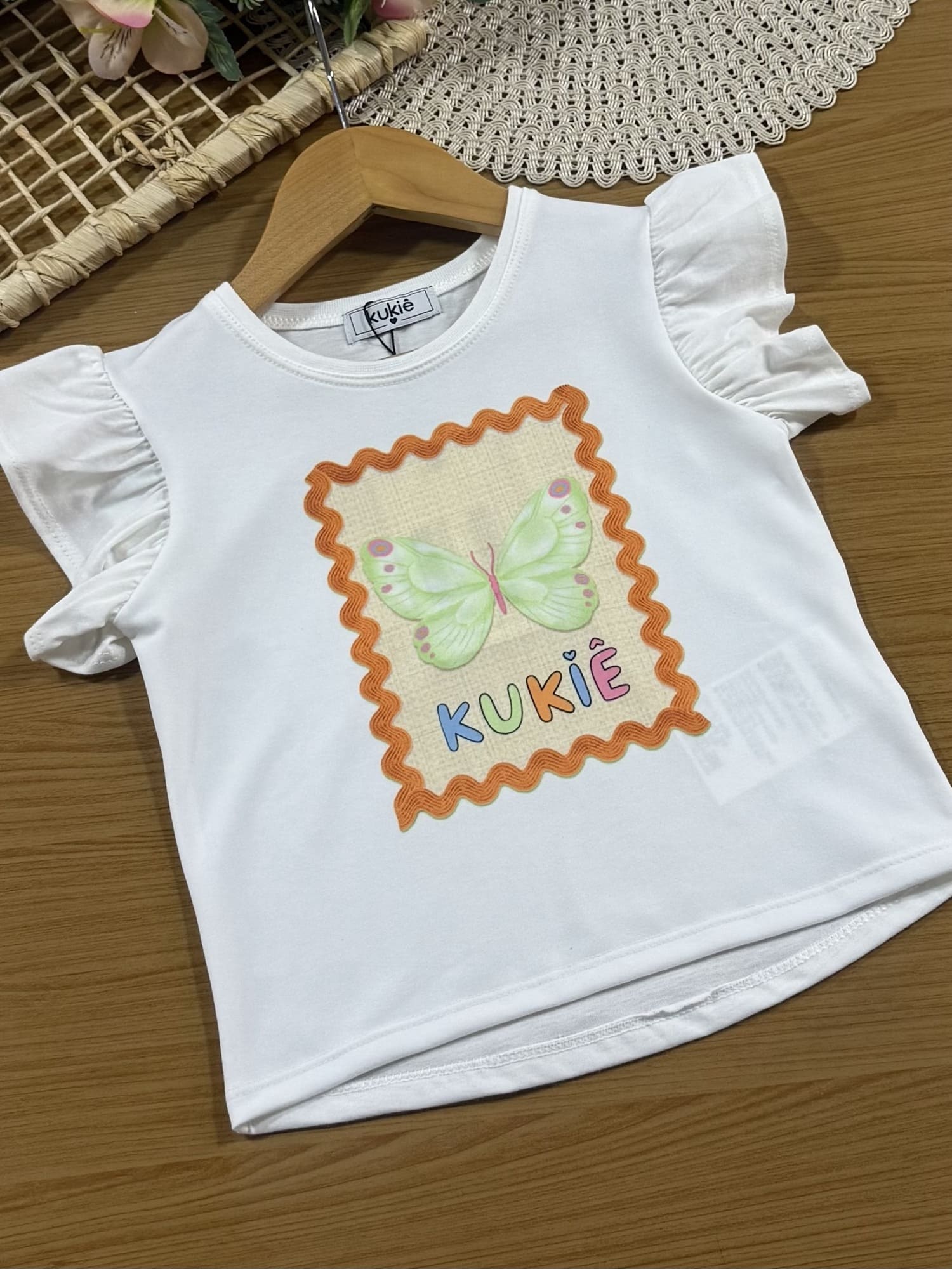 Conjunto Infantil Kukiê com Shorts Verde e Blusa Manga Curta Borboleta