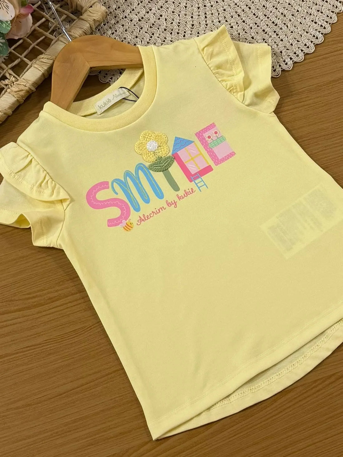 Conjunto Infantil Menina Kukiê com Shorts Ciclista Colorido e Blusa Amarela Smile