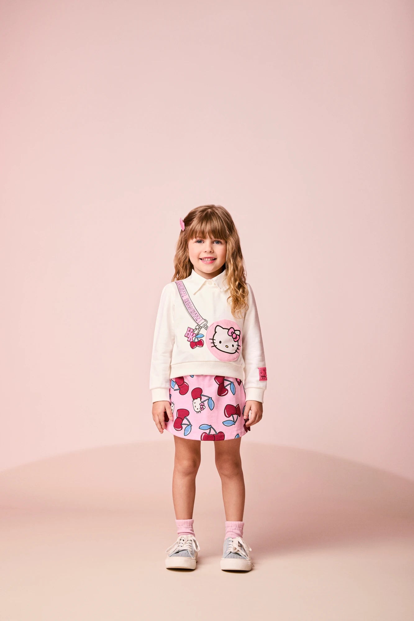 Conjunto Infantil Momi Inverno com Shorts Saia Rosa e Moletom sem Flanela Bolsinha Hello Kitty 3D