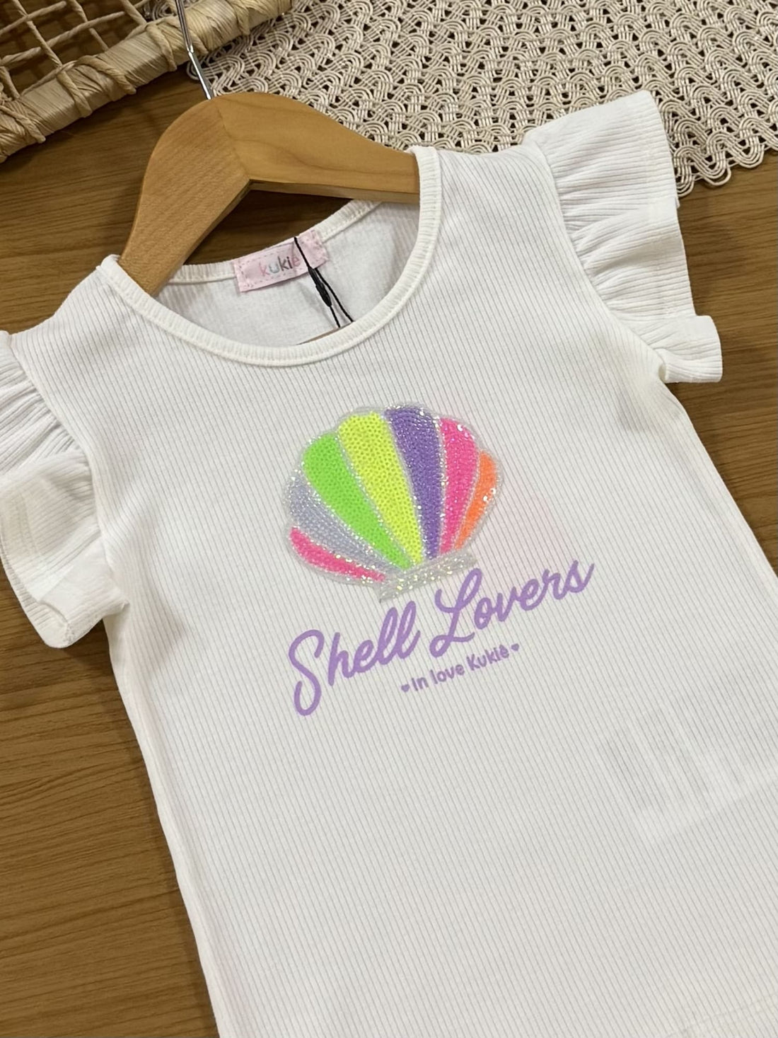 Conjunto Infantil Kukiê Verão com Shorts Saia Colorido e Blusa Branca Concha